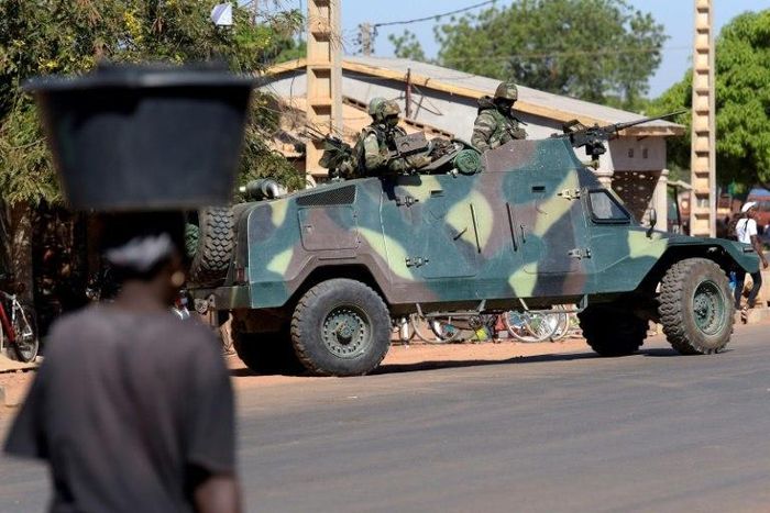 Coalition military soldiers patrol the town of Soma on January 23, 2017
