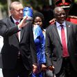 Turkey's President Recep Tayyip Erdogan (L) and Tanzanian counterpart John Pombe Magufuli arrive at State House in Dar es Salaam on January 23, 2017