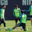 Barcelona's Lionel Messi (L) chats with teammate Neymar (2ndL) and Gerard Pique (R) during a training session at the Sports Center FC Barcelona Joan Gamper in Sant Joan Despi, near Barcelona, on April 22, 2017