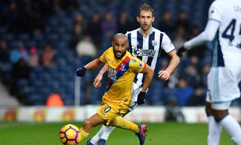 Crystal Palace's Andros Townsend runs with the ball during their English Premier League football match against West Bromwich Albion in West Bromwich, central England, on March 4, 2017 Crystal Palace won the game 2-0.