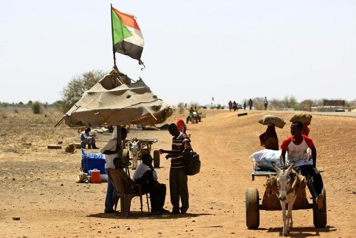 South Sudanese refugees cross along the border in Sudan's White Nile state on February 28, 2017