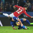 Leicester City's defender Christian Fuchs vies with Manchester United's midfielder Henrikh Mkhitaryan during the English Premier League football match between Leicester City and Manchester United on February 5, 2017
