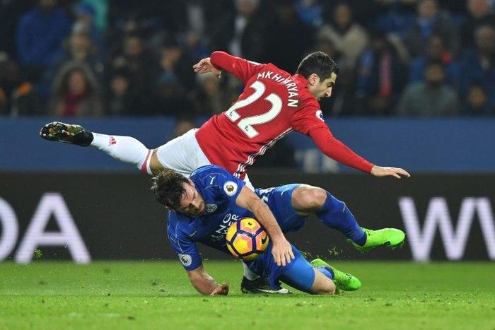 Leicester City's defender Christian Fuchs vies with Manchester United's midfielder Henrikh Mkhitaryan during the English Premier League football match between Leicester City and Manchester United on February 5, 2017