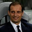 Juventus' coach Massimiliano Allegri sits on the bench during the UEFA Champions League match between Porto and Juventus at the Dragao stadium in Porto on February 22, 2017