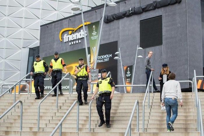 Police patrol outside the Friends Arena in Solna outside Stockholm on May 23, 2017, on the eve of the UEFA Europa League football final between Ajax Amsterdam and Manchester United