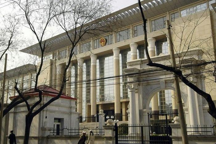 China's Supreme People's Court cleared Nie Shubin, who was shot by firing squad in 1995, saying facts in the original trial were "unclear" and evidence "insufficient"