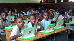 Class one pupils with their laptops at one of the primary schools in Kenya. Education CS Fred Matiang'i has said that parents are not expected to pay any admission fee for their children joining class one in public primary schools.