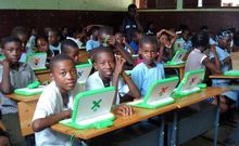 Class one pupils with their laptops at one of the primary schools in Kenya. Education CS Fred Matiang'i has said that parents are not expected to pay any admission fee for their children joining class one in public primary schools.