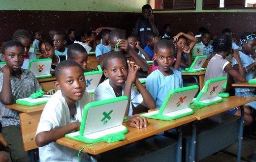 Class one pupils with their laptops at one of the primary schools in Kenya. Education CS Fred Matiang'i has said that parents are not expected to pay any admission fee for their children joining class one in public primary schools.