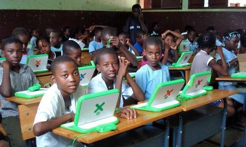 Class one pupils with their laptops at one of the primary schools in Kenya. Education CS Fred Matiang'i has said that parents are not expected to pay any admission fee for their children joining class one in public primary schools.