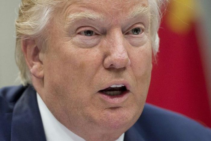 US President Donald Trump signed an order -- which temporarily freezes new visas for Syrians, Iranians, Libyans, Somalis, Yemenis and Sudanese citizens -- behind closed doors