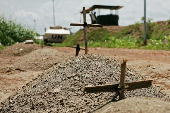 Makeshift graves are seen at the UN House for internally displaced persons in Juba on July 22, 2016