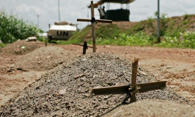 Makeshift graves are seen at the UN House for internally displaced persons in Juba on July 22, 2016