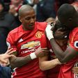 Manchester United's Ashley Young (L) is a former England international and has made just 13 starts for his club this season