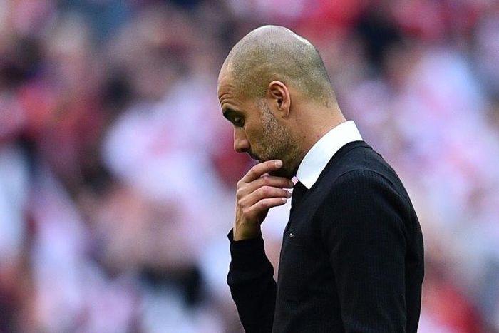 Manchester City's manager Pep Guardiola suffers defeat after the FA Cup semi-final football match against Arsenal at Wembley stadium in London on April 23, 2017
