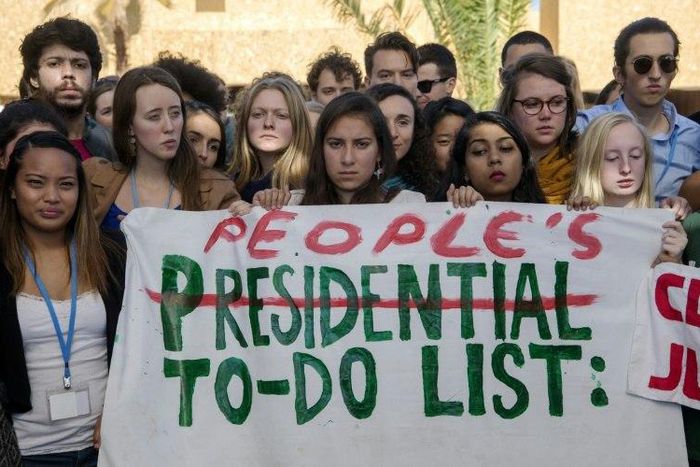 American students protest outside the UN climate talks in Marrakesh in reaction to Donald Trump's victory in the US presidential election