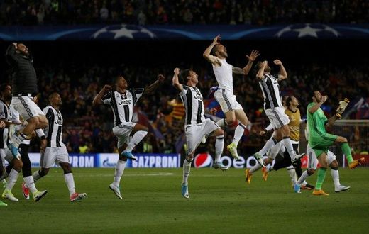 Juventus players celebrate winning after their UEFA Champions League quarter-final second leg match against Barcelona at the Camp Nou stadium in Barcelona on April 19, 2017