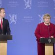 Norway`s Prime Minister Erna Solberg (R) and Foreign Minister Borge Brende attend a press conference in Oslo on May 17, 2017, after the release of Norwegian-British citizen Joshua French from a Congo prison