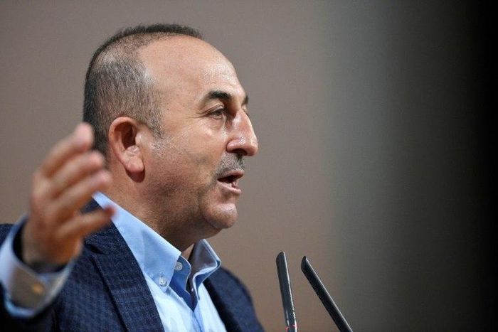 Turkish Foreign Minister Mevlut Cavusoglu threatens to unilaterally scrap migrant deal with the EU amid escalating diplomatic crisis