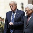 US President Donald Trump (L) is welcomed by Palestinian leader Mahmud Abbas at the presidential palace in the West Bank city of Bethlehem on May 23, 2017