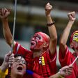 Chinese fans cheer during the 2018 World Cup qualifier against South Korea in Seoul on September 1, 2016