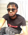 Man rocking short fringe braids (Instagram papaoyeyemi)