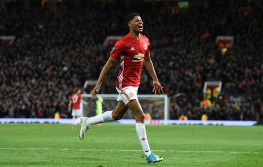 Manchester United's striker Marcus Rashford celebrates scoring their second goal during the UEFA Europa League quarter-final second leg football match against Anderlecht April 20, 2017