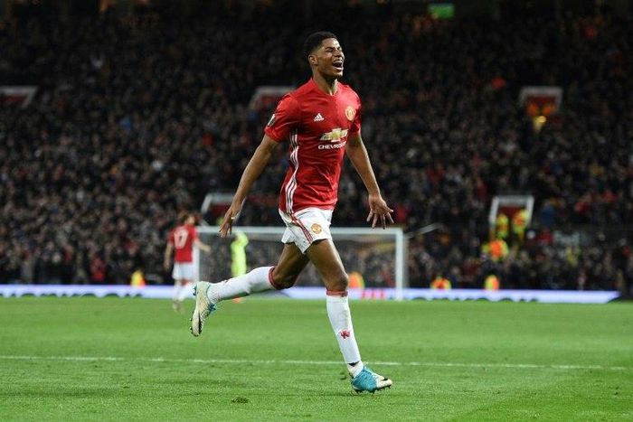 Manchester United's striker Marcus Rashford celebrates scoring their second goal during the UEFA Europa League quarter-final second leg football match against Anderlecht April 20, 2017