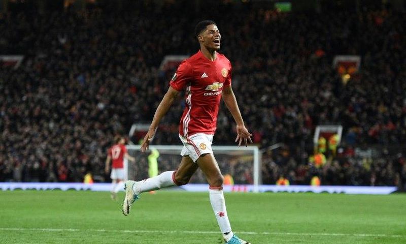 Manchester United's striker Marcus Rashford celebrates scoring their second goal during the UEFA Europa League quarter-final second leg football match against Anderlecht April 20, 2017