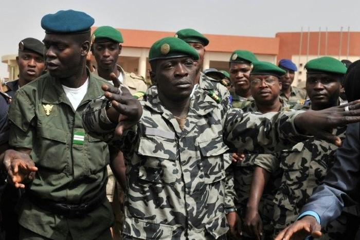 Malian military coup leader Amadou Sanogo was arrested in November 2013 after handing over power to a transitional regime in a deal brokered by the Economic Community of West African States