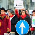 Activists of several non-governmental organizations show their logos during an anti-government demonstration in front of the Hungarian parliament in Budapest on February 5, 2017