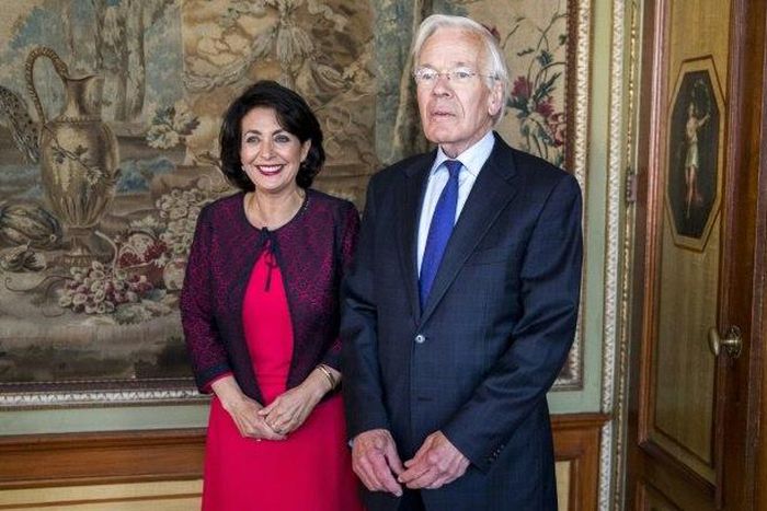 Retired Dutch politician Herman Tjeenk Willink (R) meets Chairman of the senate Khadija Arib in The Hague, on May 30, 2017, after he was appointed as the moderator for a new round of negotiations to form a coalition government