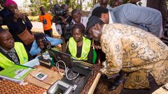 Raila Odinga (right) during an inspection of the Mass Voter Registration (MVR) exercise at Lavington Primary School.