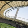 Nasser Al-Khater, a senior organizing figure of the Qatar World Cup, speaks to journalists during a tour of the Khalifa International Stadium in Doha on May 18, 2017