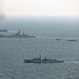 In a picture released by the British Ministry of Defence, UK ships and aircraft shadow the Russian Petr Velikiy (C) and the Russian Admiral Kuznetsov (top) as they pass through the English Channel January 24, 2017