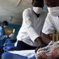 Medics treating a child at a hospital