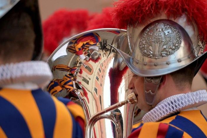Swiss guards join a long line of traditional pope protectors