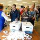 Kentucky voters place their paper ballots in the box in a GOP presidential caucus on March 5, 2016, in Louisville, Kentucky