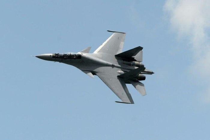 China has denied US allegations that two Chinese Sukhoi SU-30 fighter jets -- like this one from the Royal Malaysian Air Force -- intercepted an American military plane earlier this week, saying its aircrafts were acting "in accordance with the law"