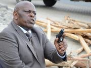 Former Senator Paul Njoroge wielding his gun during the altercation with Polycarp Igathe