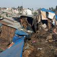 Damaged dwellings after a landslide in the main city dump of Addis Ababa