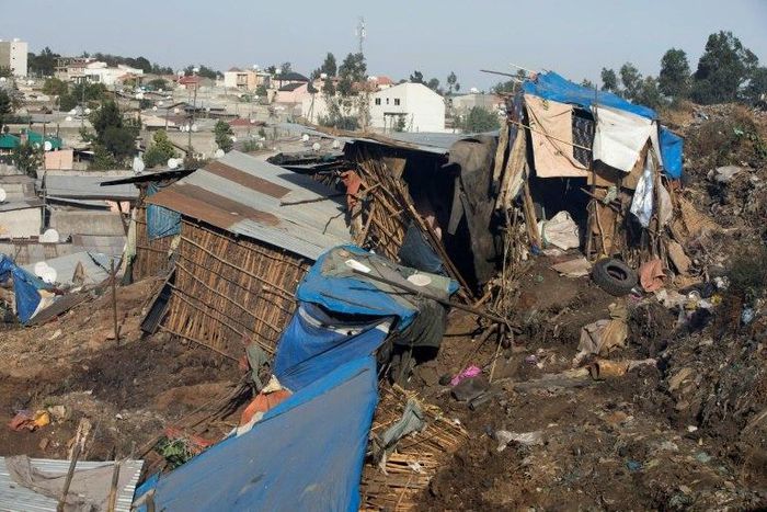 Damaged dwellings after a landslide in the main city dump of Addis Ababa