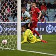 Russia's forward Alexander Bukharov scores a goal past Belgium's goalkeeper Simon Mignolet during an international friendly football match between Russia and Belgium at the Fisht Arena in Sochi on March 28, 2017
