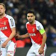 (from L) Monaco's Kamil Glik, Radamel Falcao and Jemerson keep their eye on the ball during the match against Paris Saint-Germain in Paris on January 29, 2017