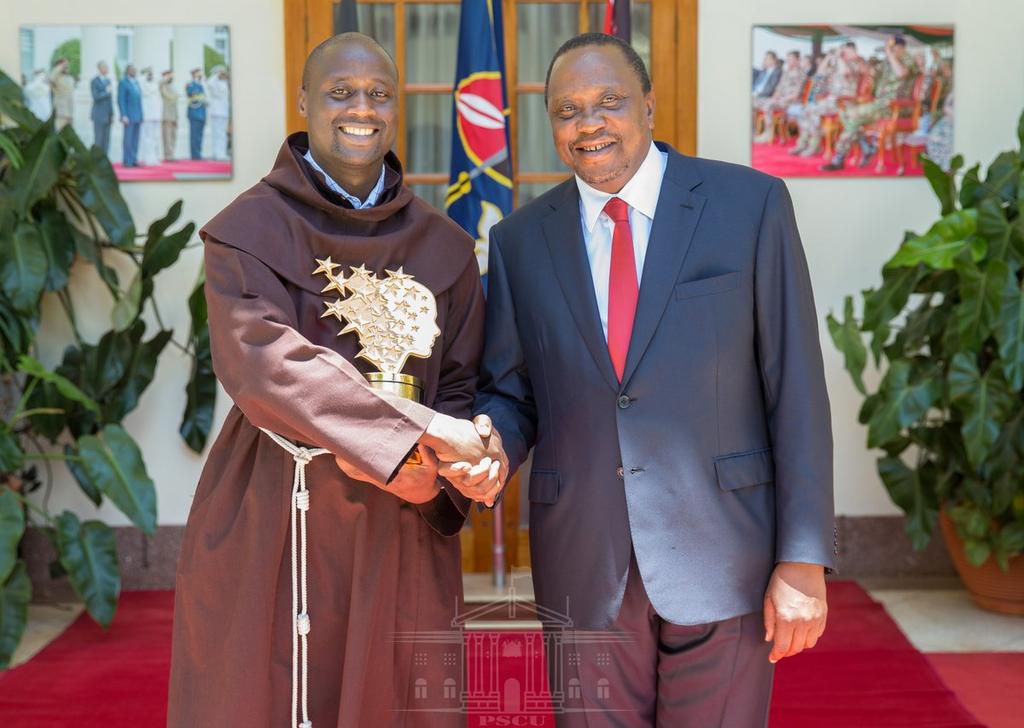 President Kenyatta with teacher Peter Tabichi