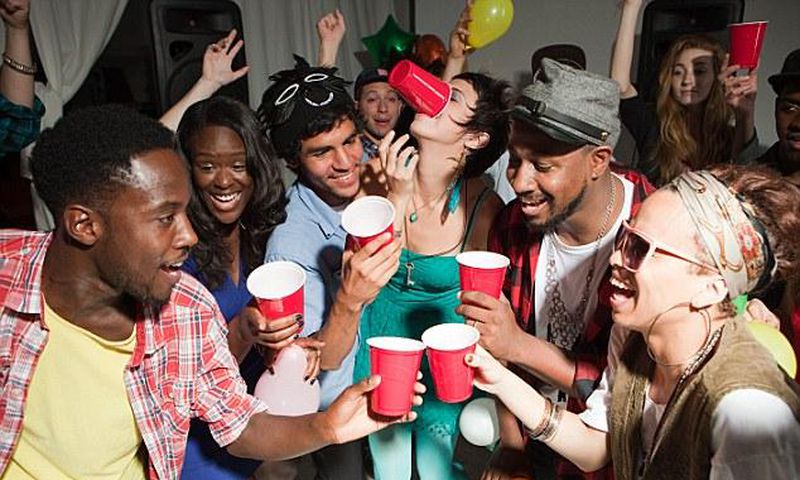 Friends at a house party (Courtesy-corbis)