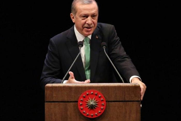 Turkish President Recep Tayyip Erdogan delivers a speech during the Living Human Treasures award ceremony at the Bestepe National Congress and Culture Centre in Ankara on November 3, 2016