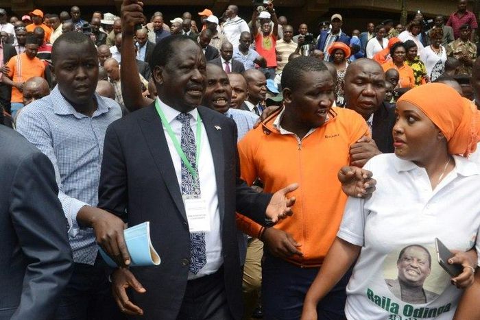 Kenya's National Super Alliance (NASA) and opposition leader Raila Odinga (C) arrives to present his candidacy for the presidential race at the Independent Electoral and Boundaries Commission in Nairobi, on May 28, 2017