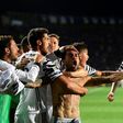 Juventus' defender Daniel Alvez da Silva celebrates with teammates after scoring during the Italian Serie A football match against Atalanta on April 28, 2017
