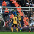 West Bromwich Albion's Craig Dawson (left) heads to score during the Premier League match against Arsenal at The Hawthorns stadium in central England, on March 18, 2017